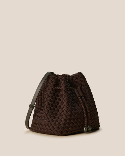 A rich chocolate-toned crossbody bucket bag featuring handwoven neoprene texture, drawstring closure, and adjustable leather strap—showcasing artisanal craftsmanship and tactile elegance by Valnera Vista-3