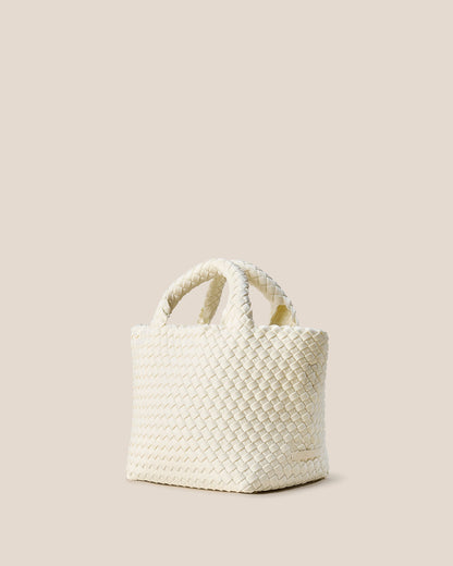 A beautifully crafted Jasmine crossbody bag featuring woven textures, compact flap closure, and elegant tassel details—embodying artisanal design and refined style-3